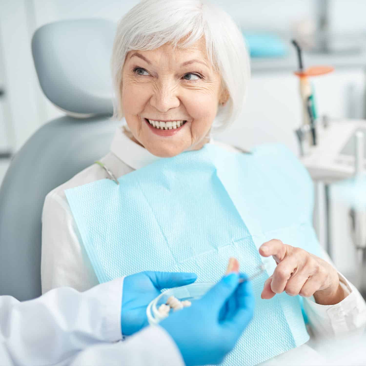 Dentures being explained to a patient