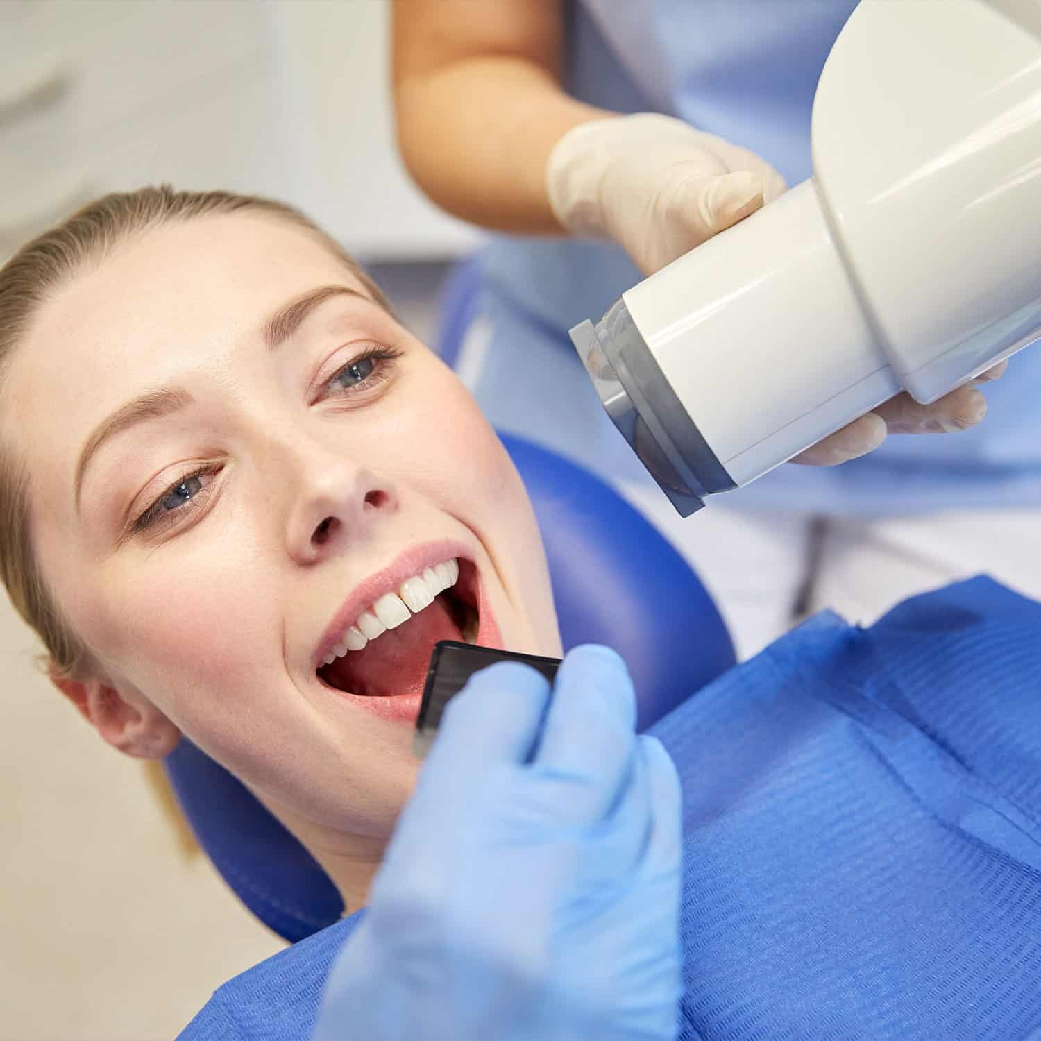 Patient doing XRay in her mouth
