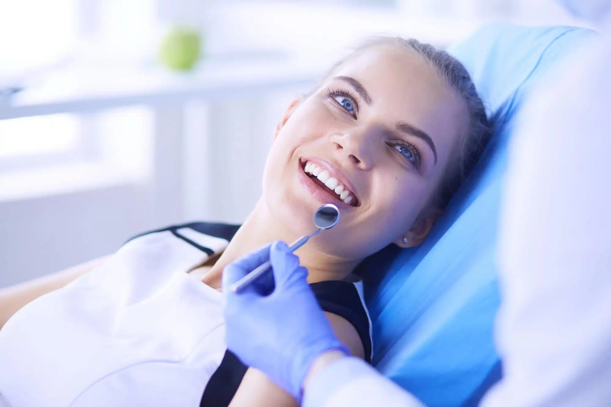 smiling at a Cosmetic Dentist in Grosse Pointe Woods