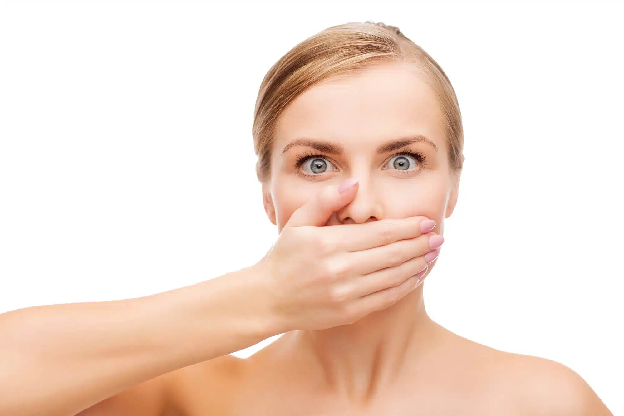 woman with bad breath needing-to-see-a-Dentist-in-Grosse-Pointe