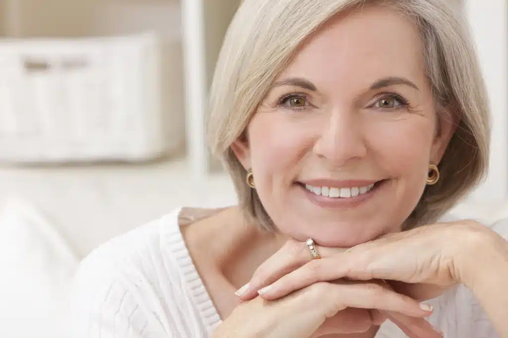 Girl-smiling-showing-her-Dentures-in-Grosse-Pointe-MI