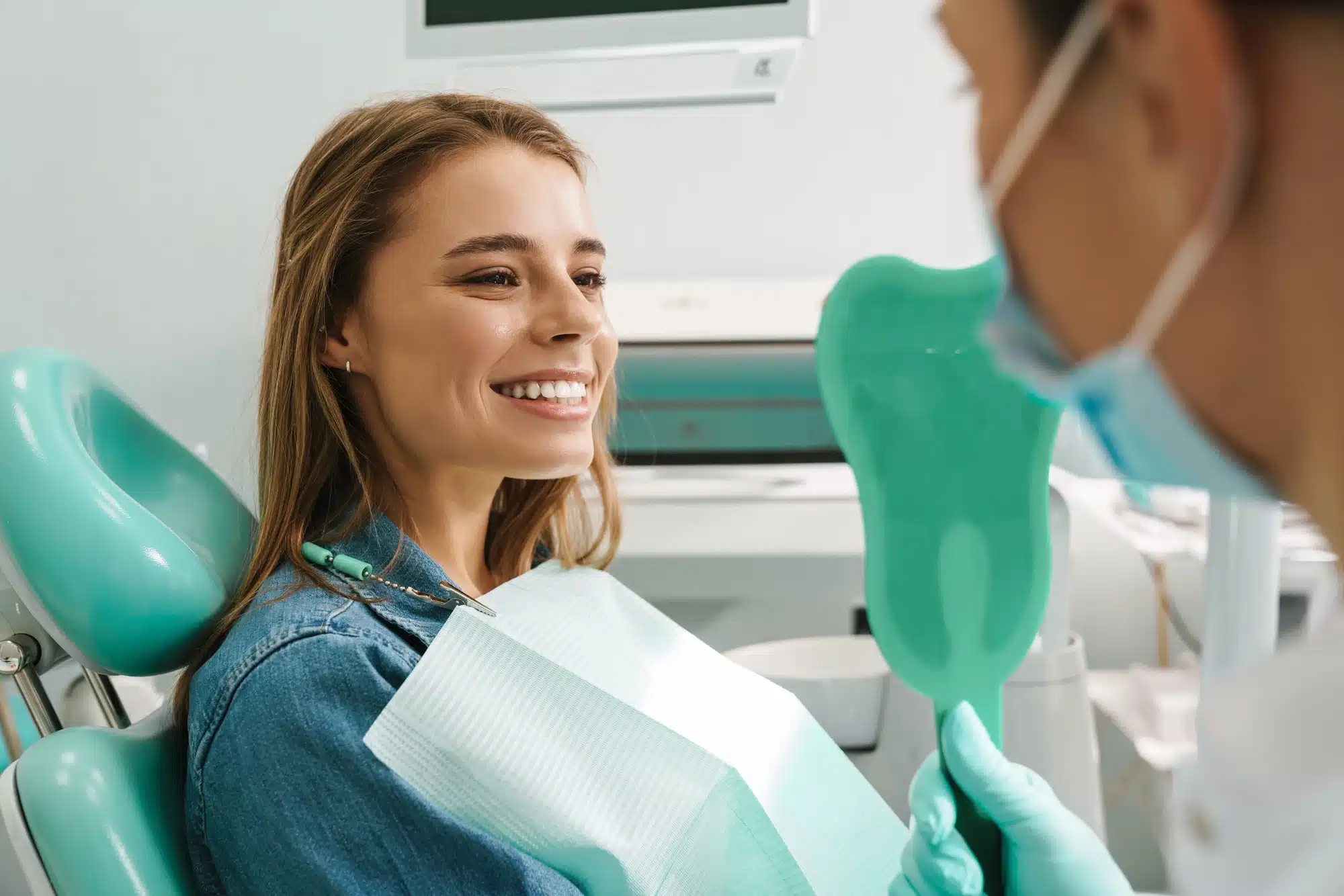 woman getting dental crowns in Grosse Pointe, MI